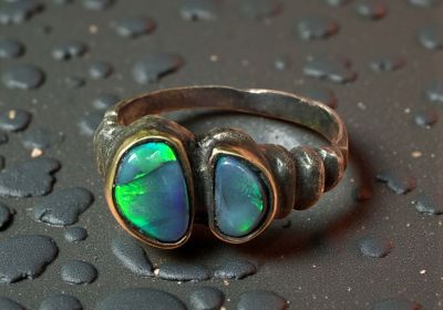 ring with 2 small opals