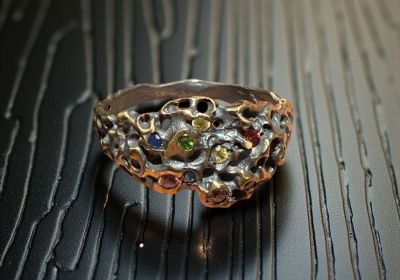 ring with colored stones (hers)