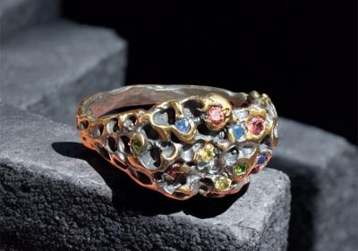 ring with colored stones (hers)